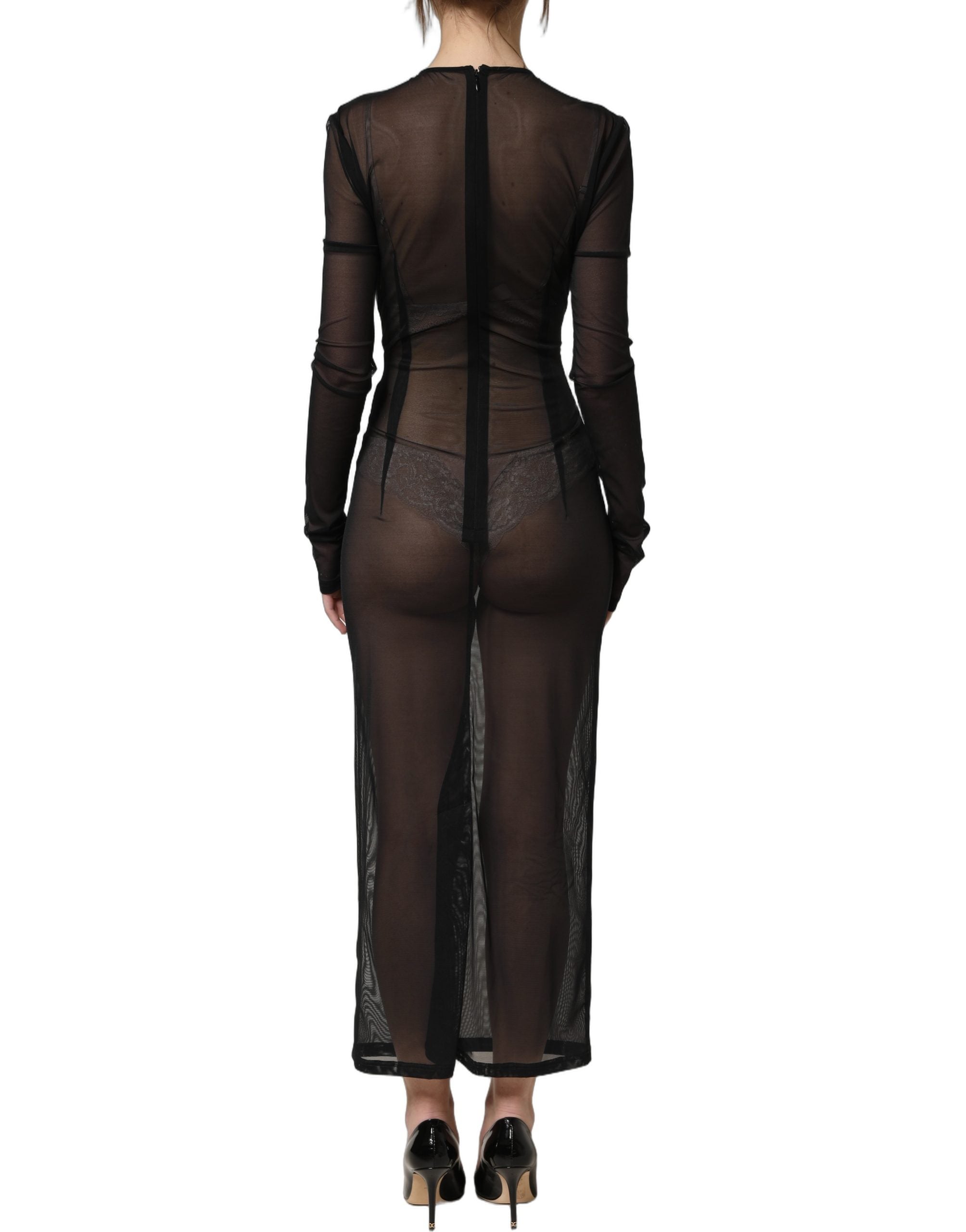 Robe longue noire en dentelle transparente Dolce & Gabbana, vêtement ajusté à manches longues pour femme.