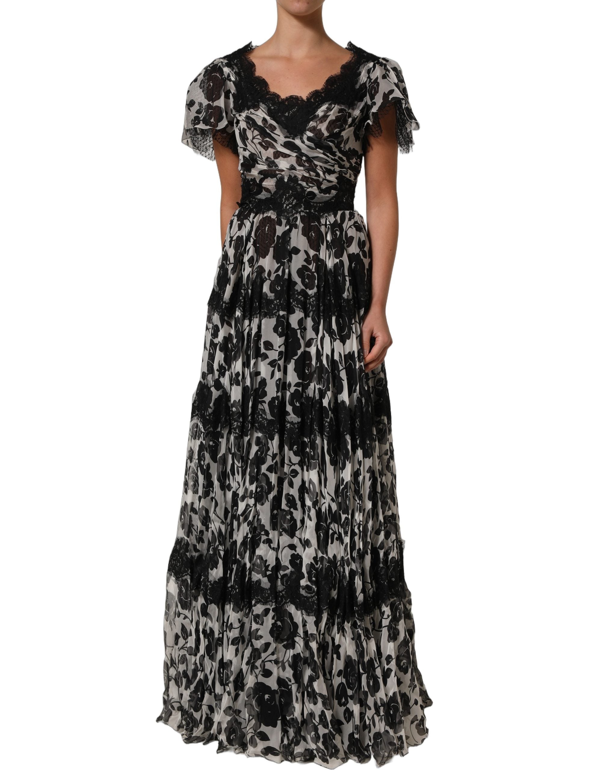 Robe longue maxi en soie noire avec broderie florale en dentelle, conçue par Dolce & Gabbana.