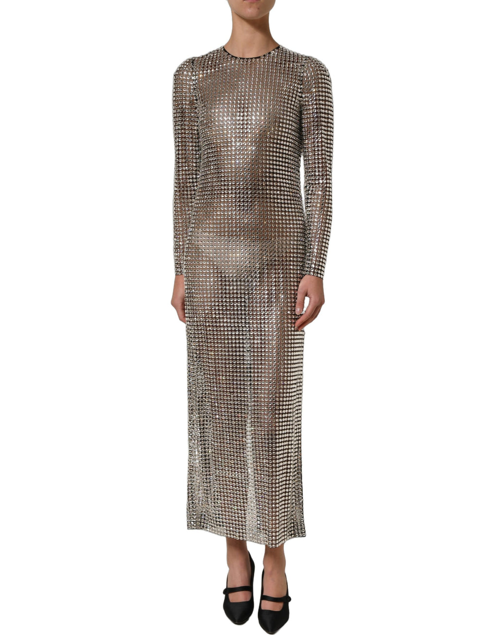 Robe longue beige Dolce & Gabbana ornée de cristaux, élégante et sophistiquée, avec des détails scintillants visibles sur la photo.