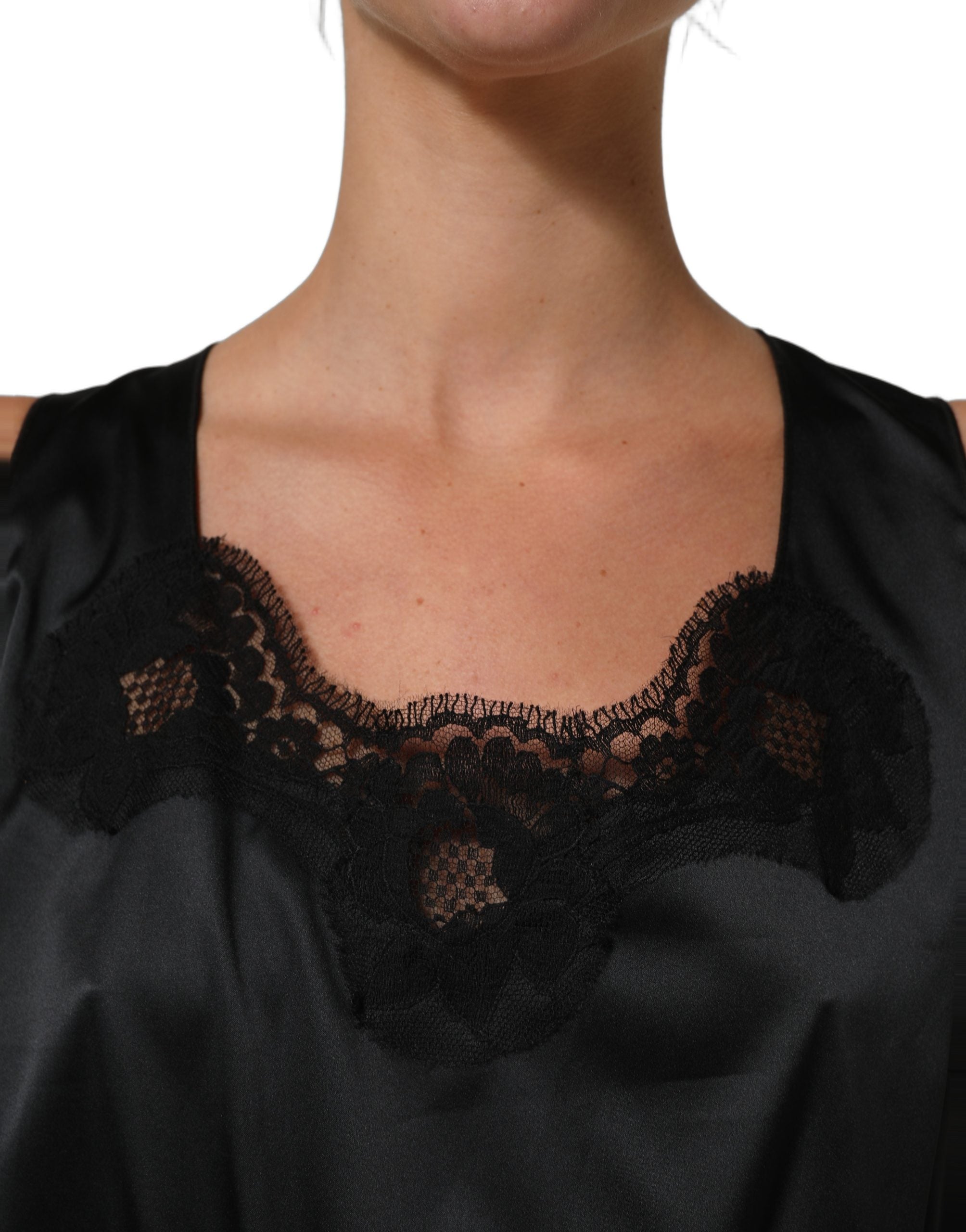 Robe midi noire en polyester avec dentelle Dolce & Gabbana, coupe ajustée et élégante, détails en dentelle sur le haut.
