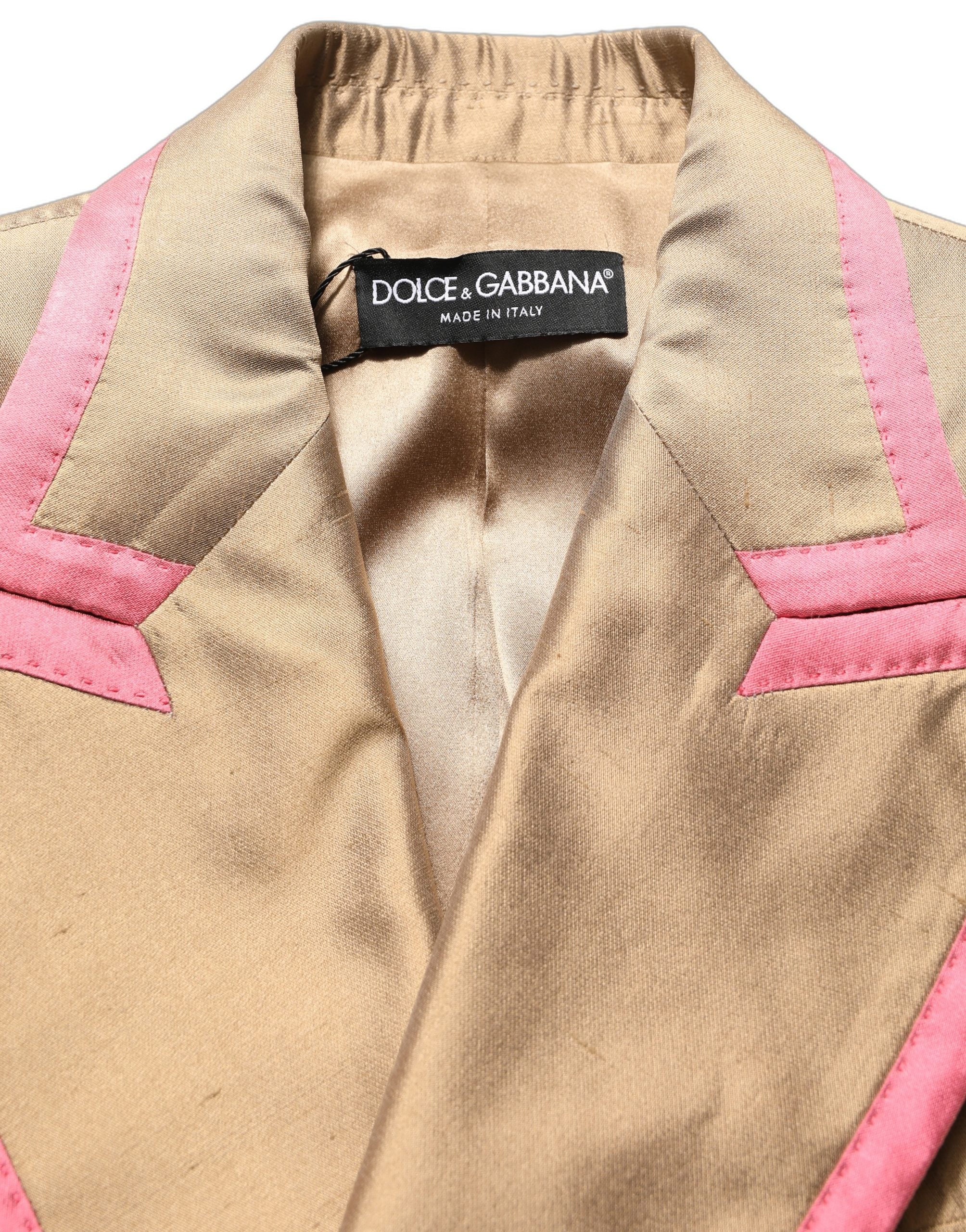 Blazer en soie dorée à double boutonnage de la marque Dolce & Gabbana, veste élégante pour femme.