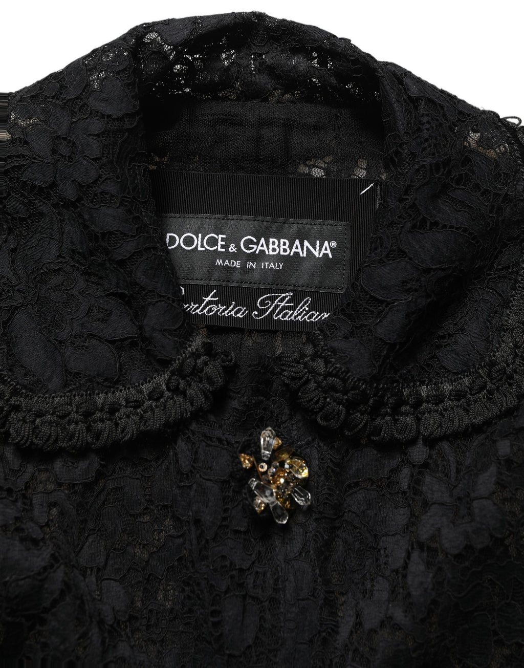 Veste en dentelle guipure noire Dolce & Gabbana ornée de broderies et embellissements, élégante et sophistiquée.