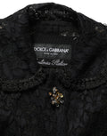 Veste en dentelle guipure noire Dolce & Gabbana ornée de broderies et embellissements, élégante et sophistiquée.