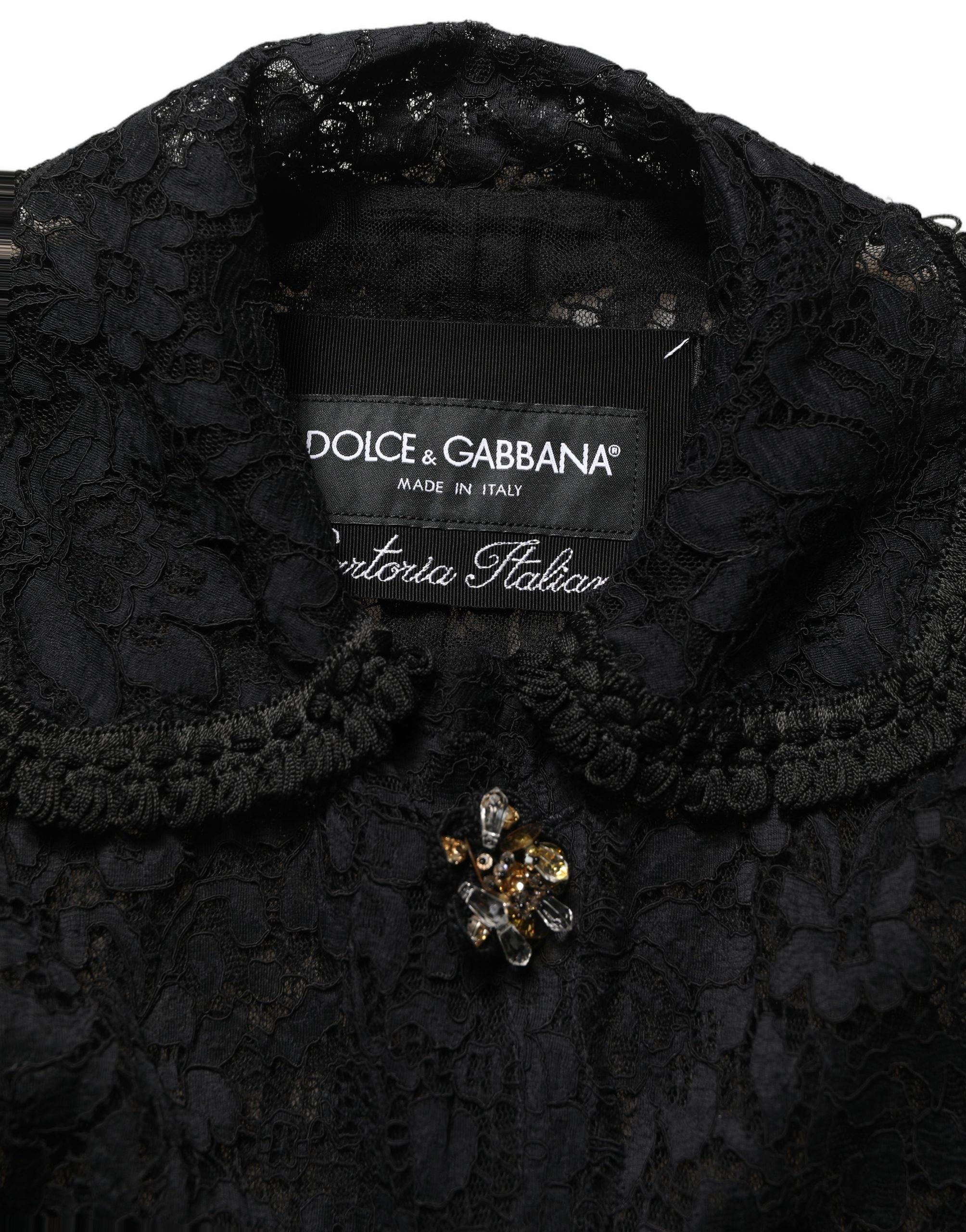 Veste en dentelle guipure noire Dolce & Gabbana ornée de broderies et embellissements, élégante et sophistiquée.