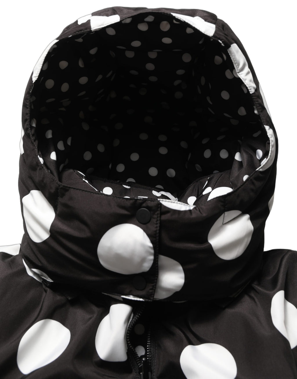 Veste blouson à capuche Dolce & Gabbana noire et blanche à pois, élégante et tendance, vue de face.