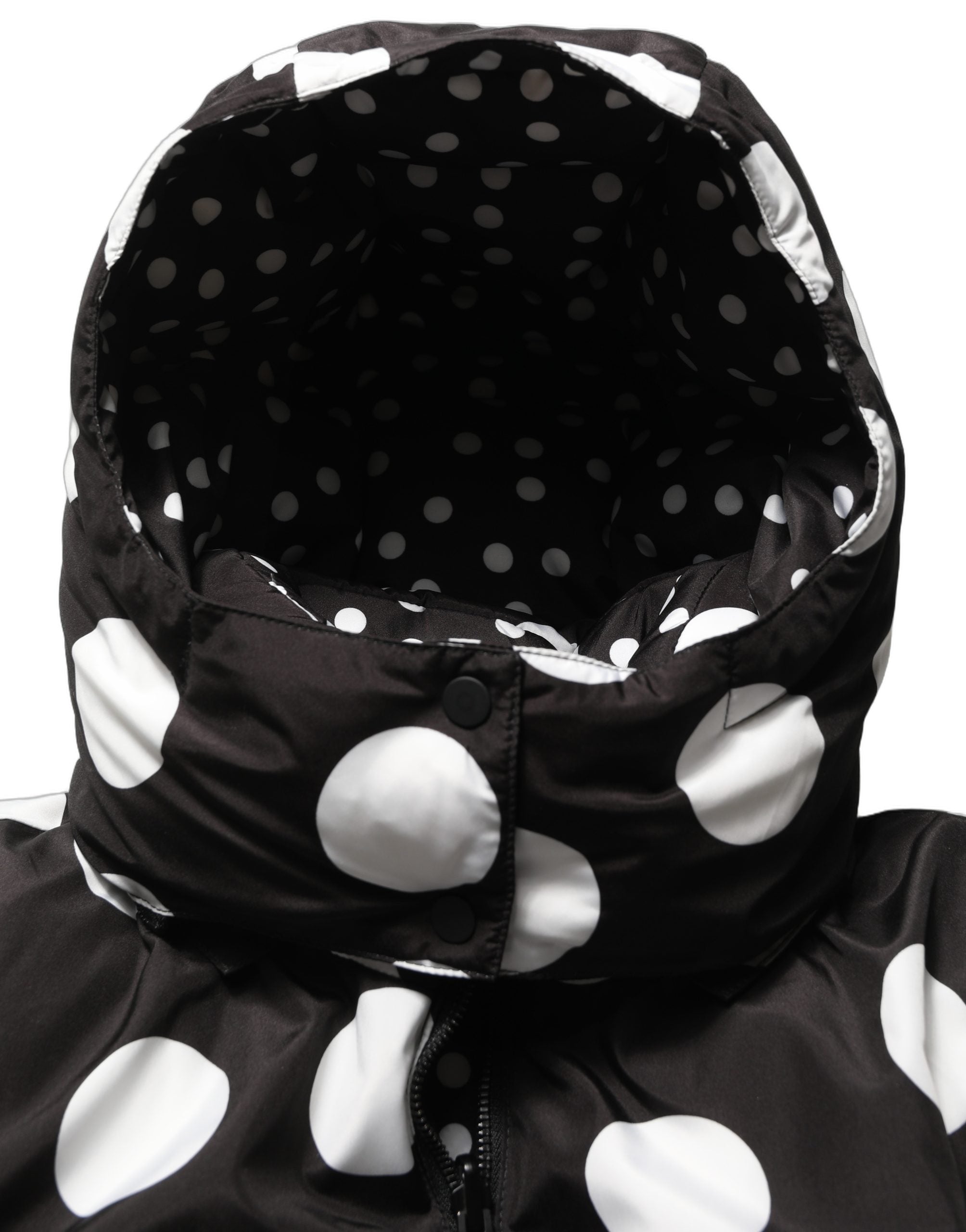 Veste blouson à capuche Dolce & Gabbana noire et blanche à pois, élégante et tendance, vue de face.