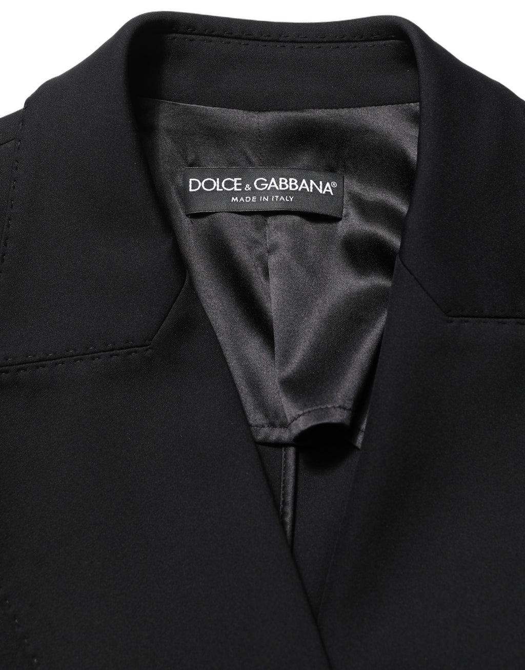 Veste blazer en crêpe noir à double boutonnage Dolce & Gabbana, style élégant et moderne, vue de face.