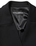 Veste blazer en crêpe noir à double boutonnage Dolce & Gabbana, style élégant et moderne, vue de face.