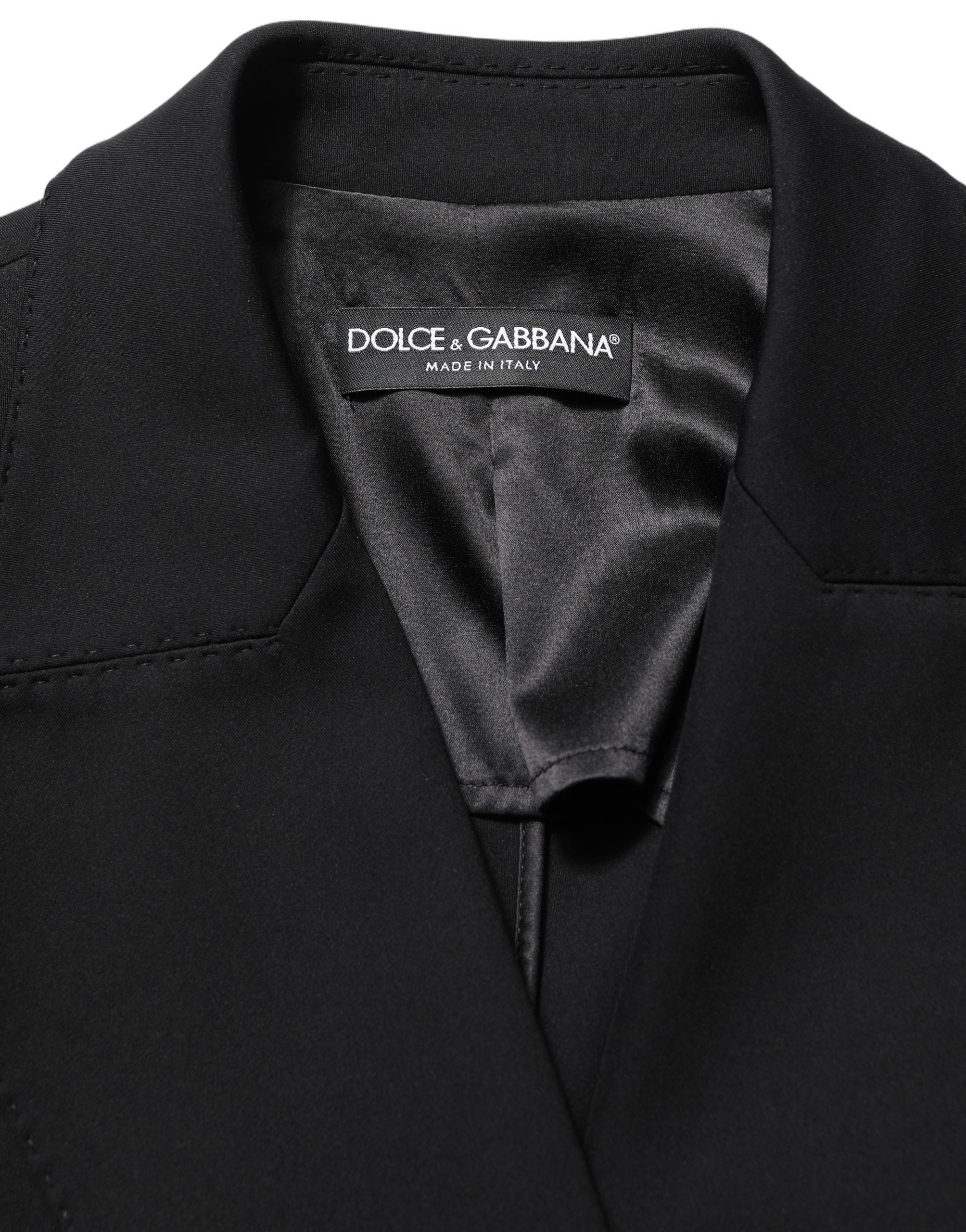 Veste blazer en crêpe noir à double boutonnage Dolce & Gabbana, style élégant et moderne, vue de face.