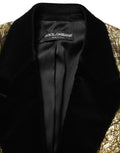 Manteau trench en laine jacquard floral or de Dolce & Gabbana, veste élégante avec détails sophistiqués.