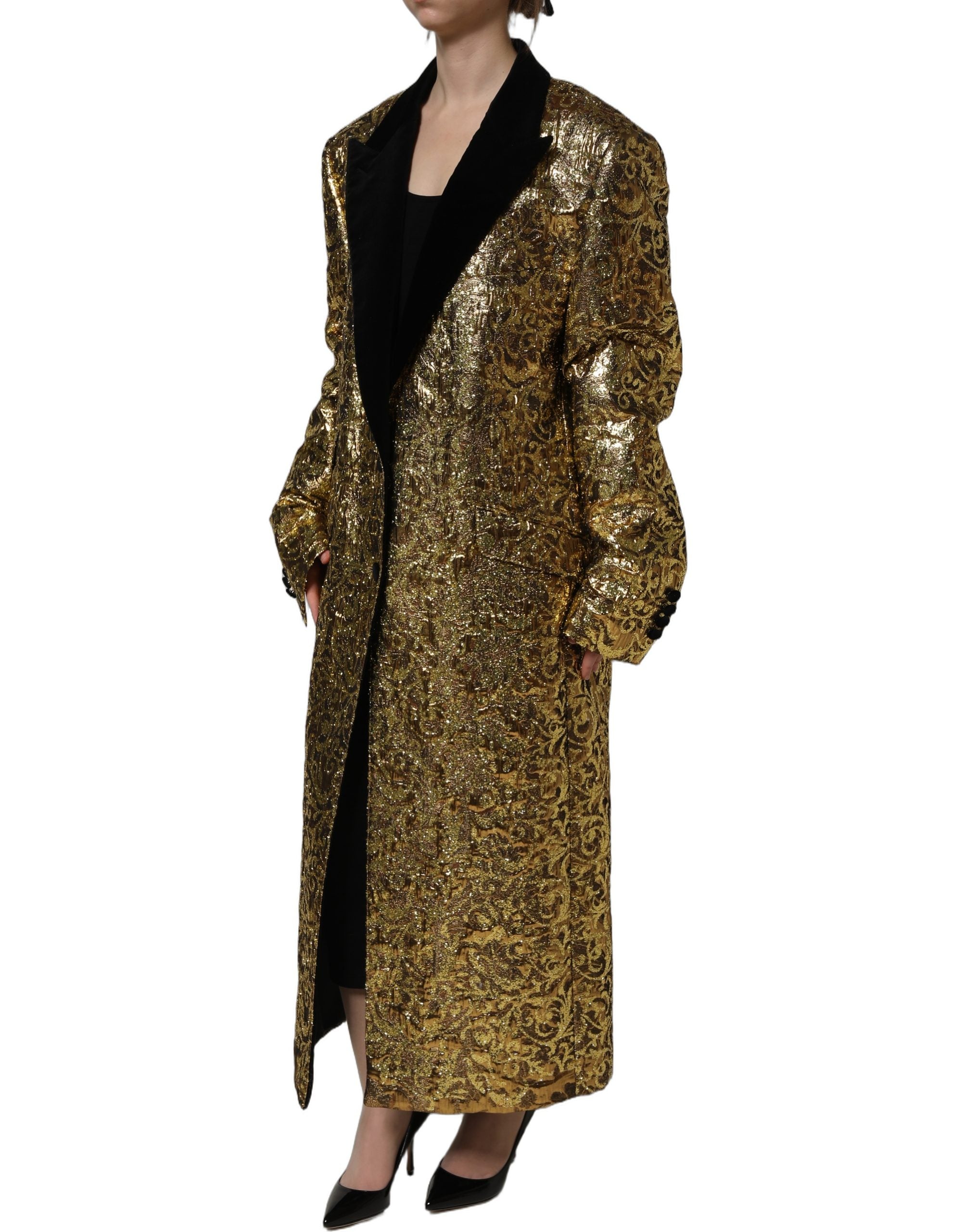 Manteau trench en laine jacquard floral doré Dolce & Gabbana, coupe élégante et détails sophistiqués, visible sur cette image.