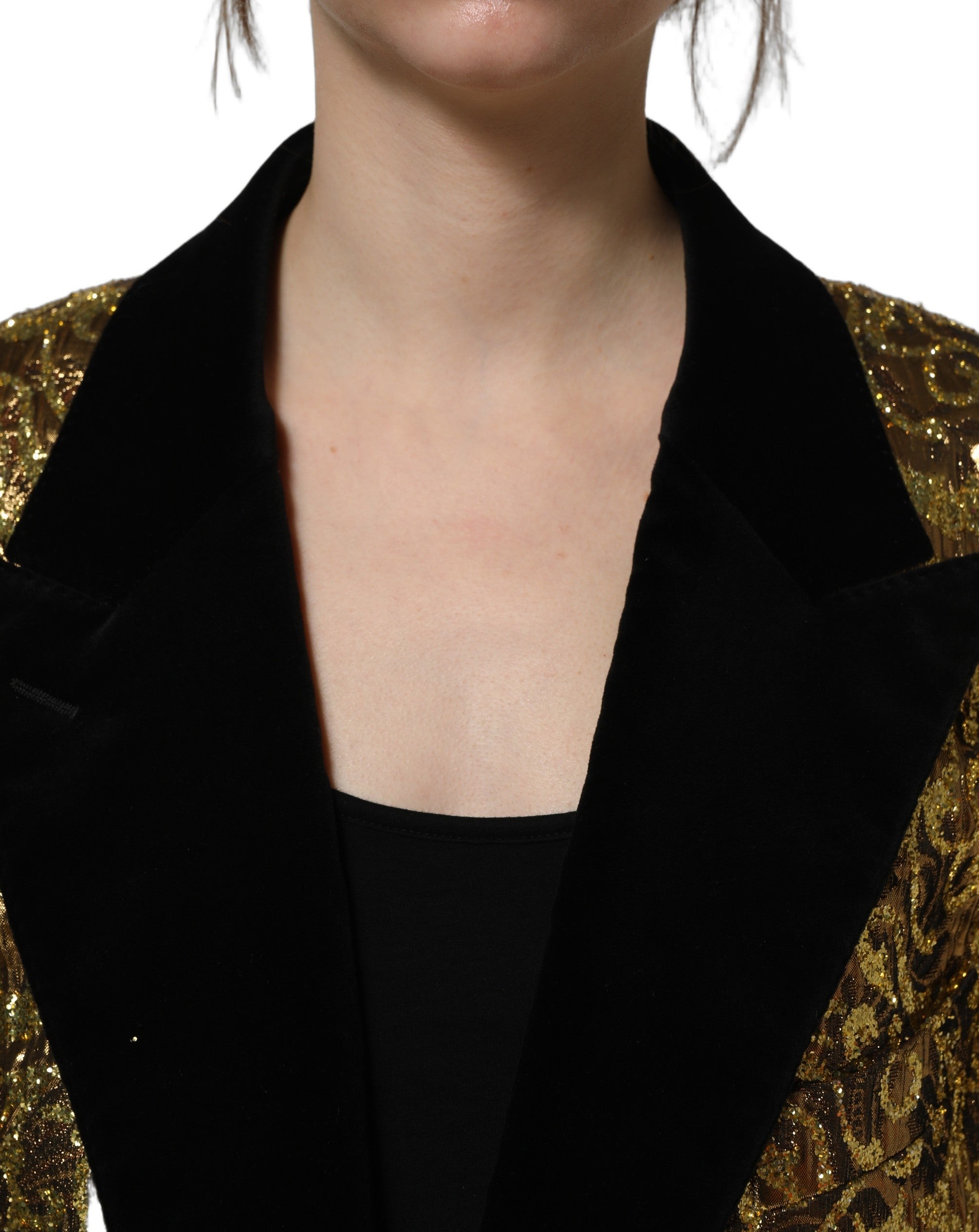 Manteau trench en laine jacquard floral or de Dolce & Gabbana, coupe élégante et détails sophistiqués.