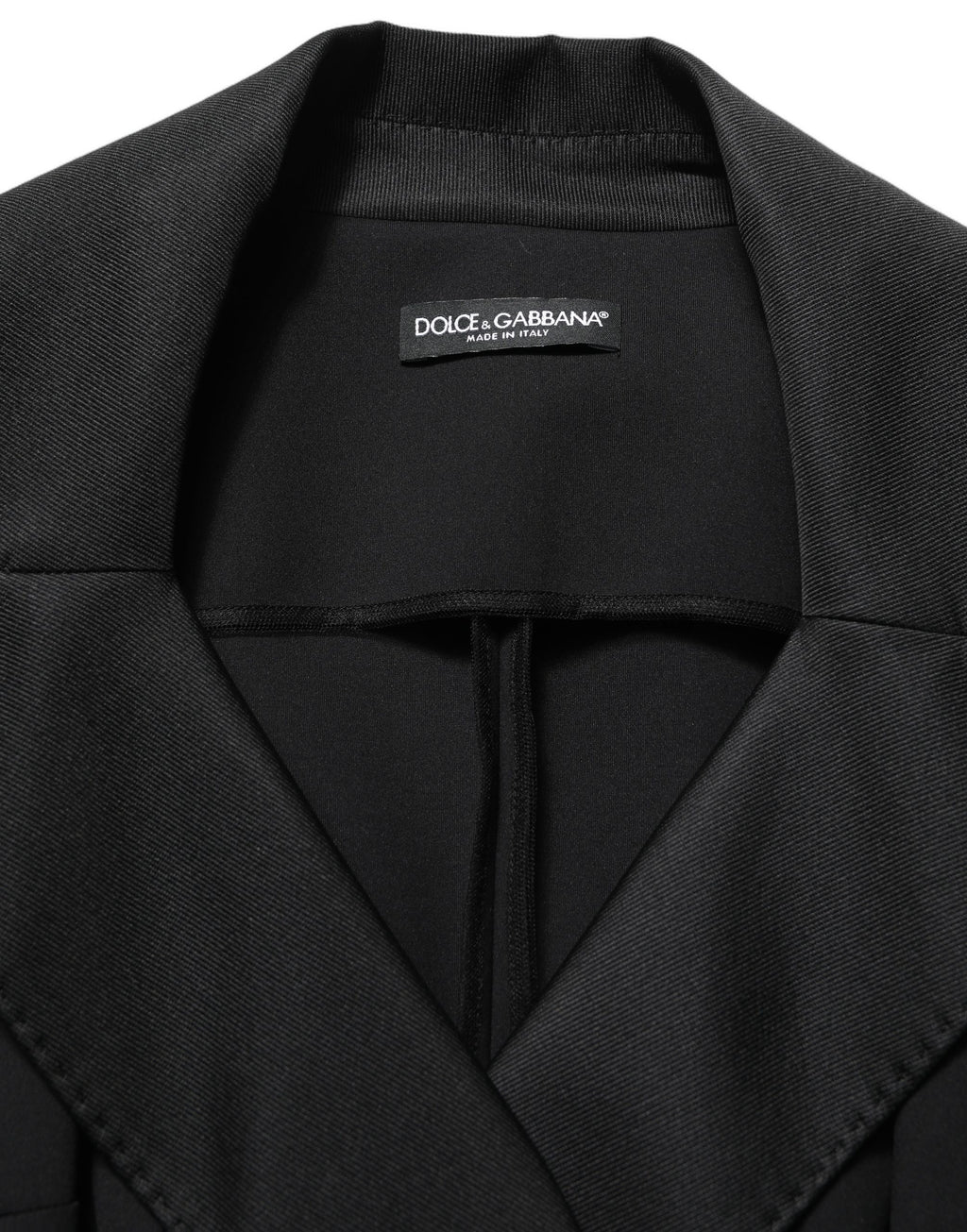 Veste noire en nylon double boutonnage de Dolce & Gabbana, coupe élégante et moderne, avec détails sophistiqués.