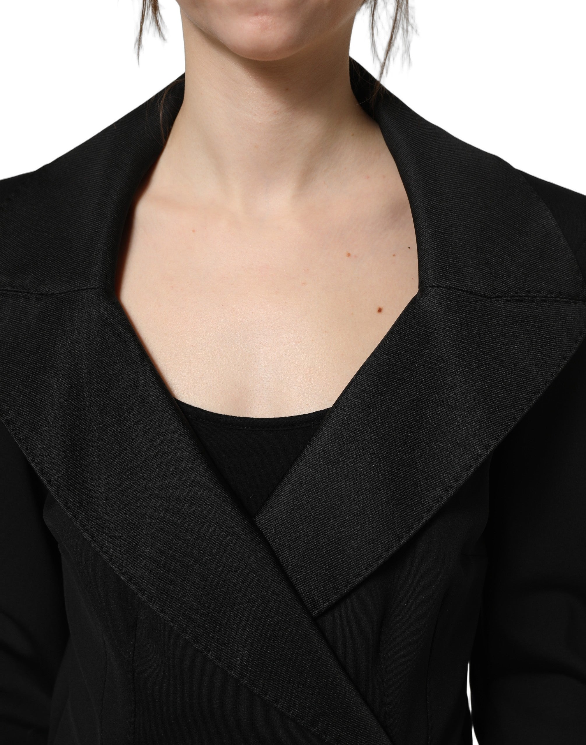 Veste en nylon noir Dolce & Gabbana à double boutonnage, style élégant et coupe classique, vue de face sur fond neutre.