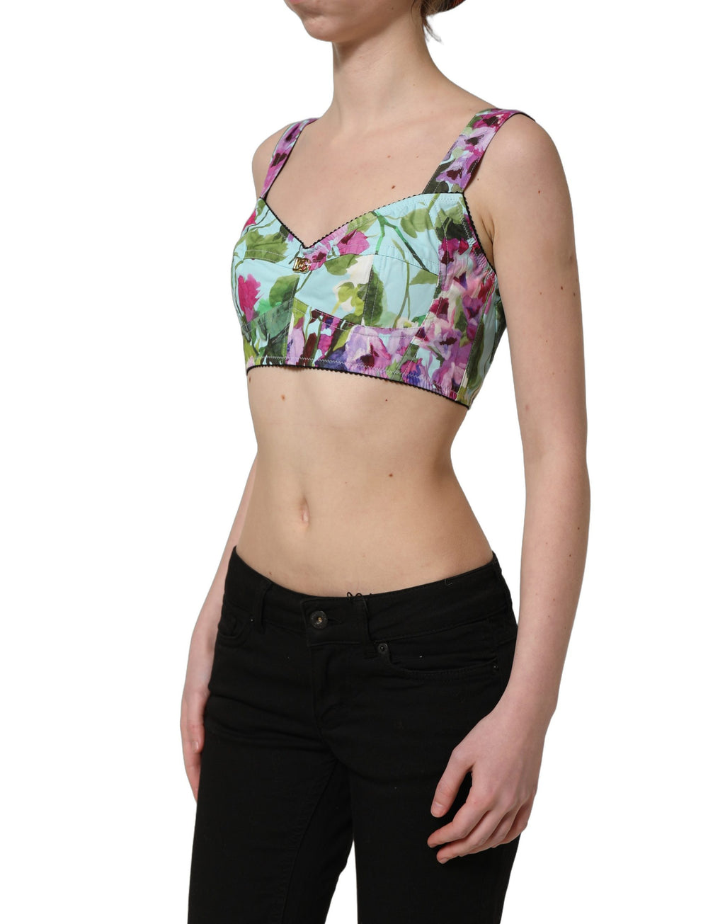 Top bustier court Dolce & Gabbana à fleurs multicolores, style crop, avec motif floral vibrant et détails élégants.