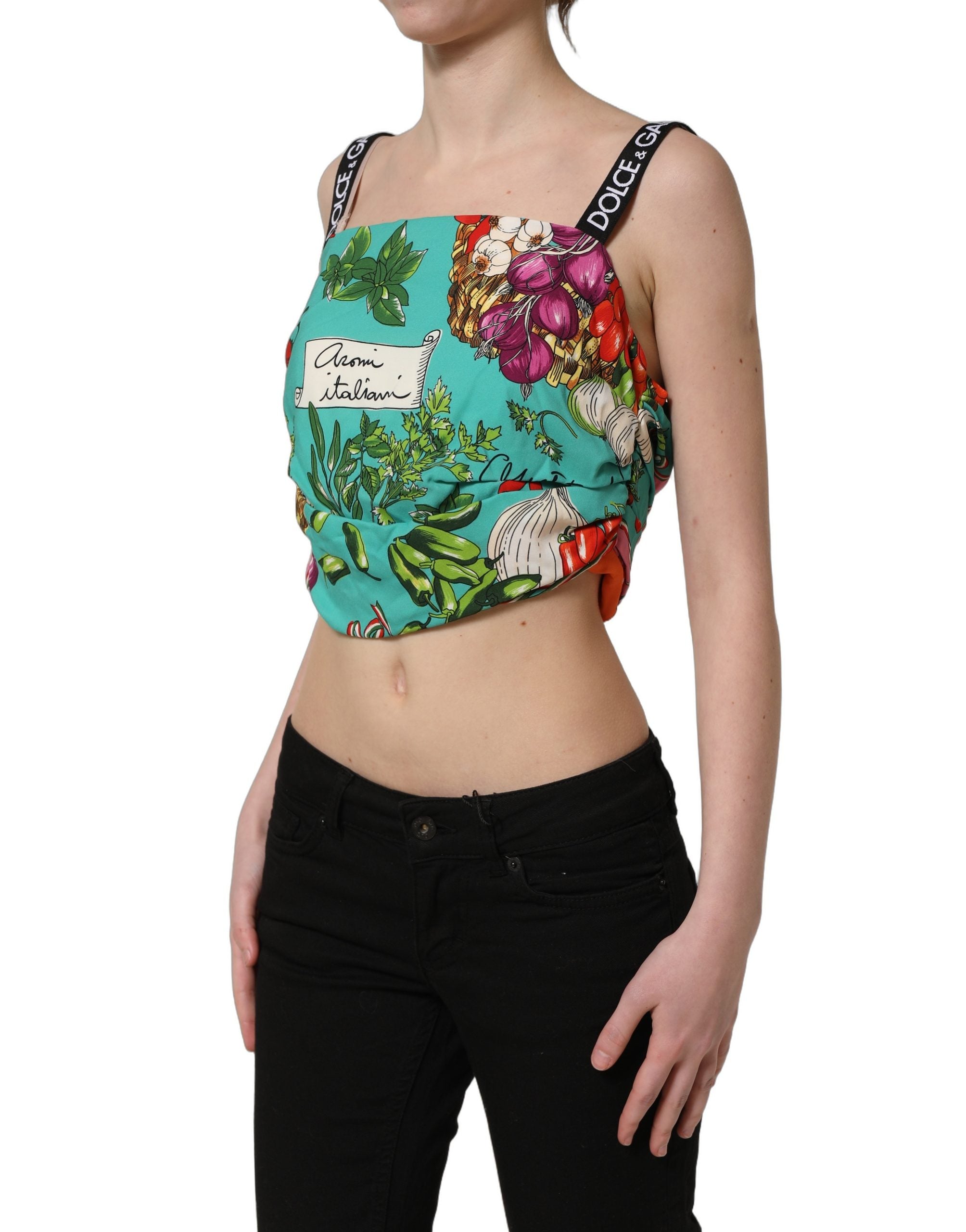 Top court en soie multicolore Dolce & Gabbana avec motif végétal, coupe courte et détails élégants.