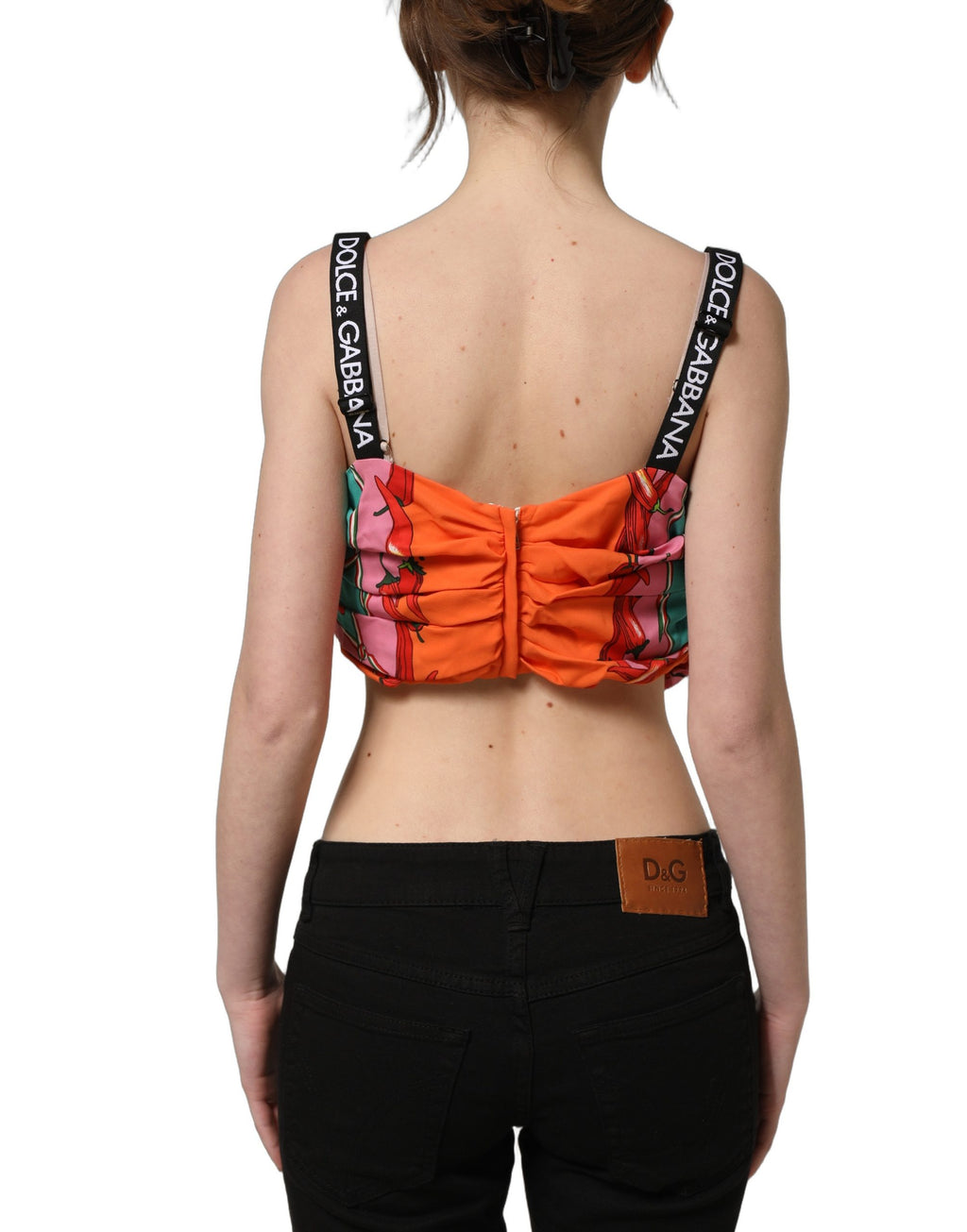 Top court Dolce & Gabbana en soie multicolore avec imprimé végétal, coupe courte et style élégant.