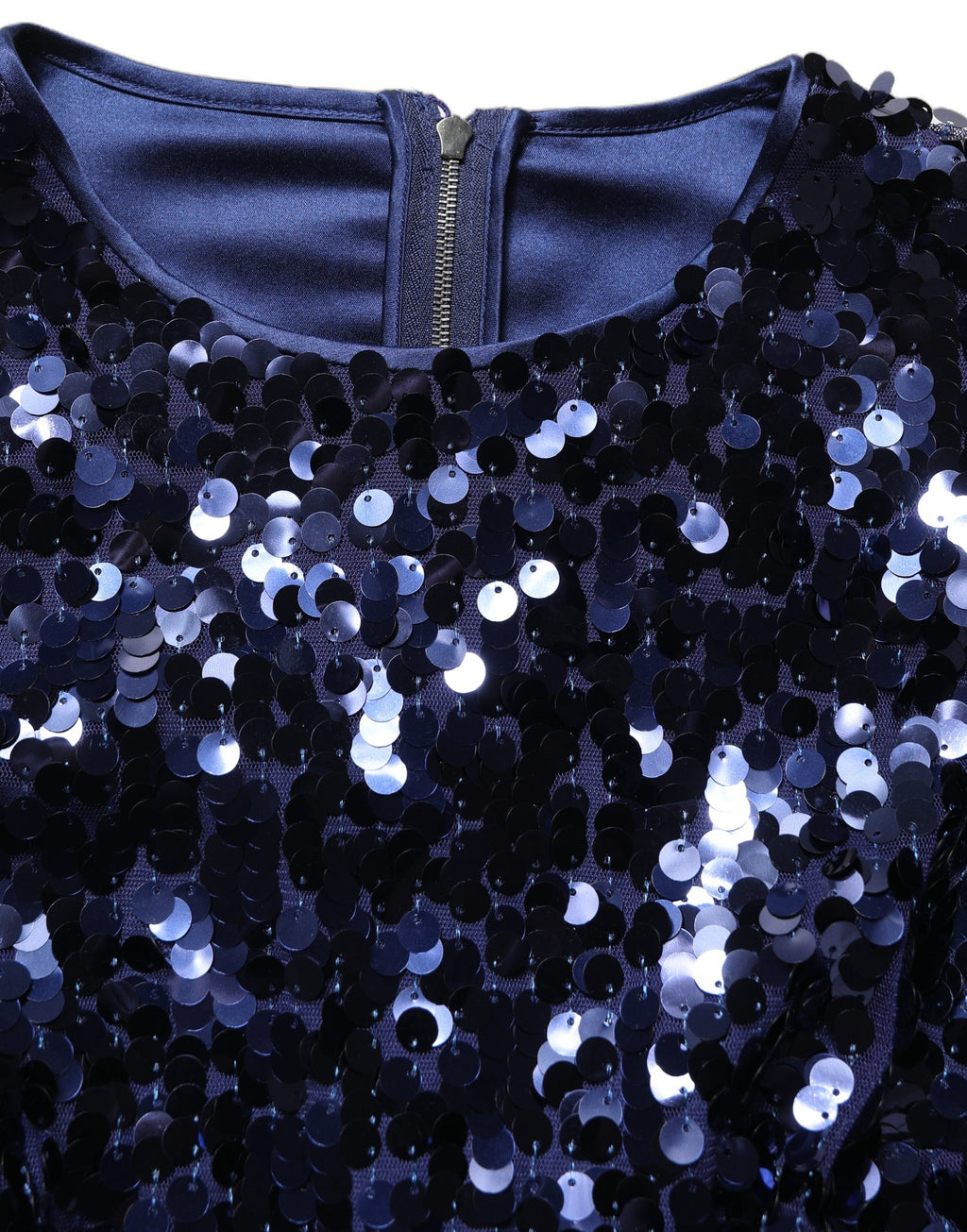 Haut court Dolce & Gabbana en sequins bleus à manches longues, style élégant et festif, avec détails brillants.