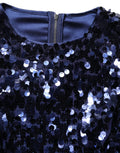 Haut court Dolce & Gabbana en sequins bleus à manches longues, style élégant et festif, avec détails brillants.