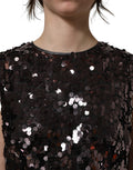 Top court sans manches Dolce & Gabbana violet à sequins, cropped, avec design brillant et élégant.