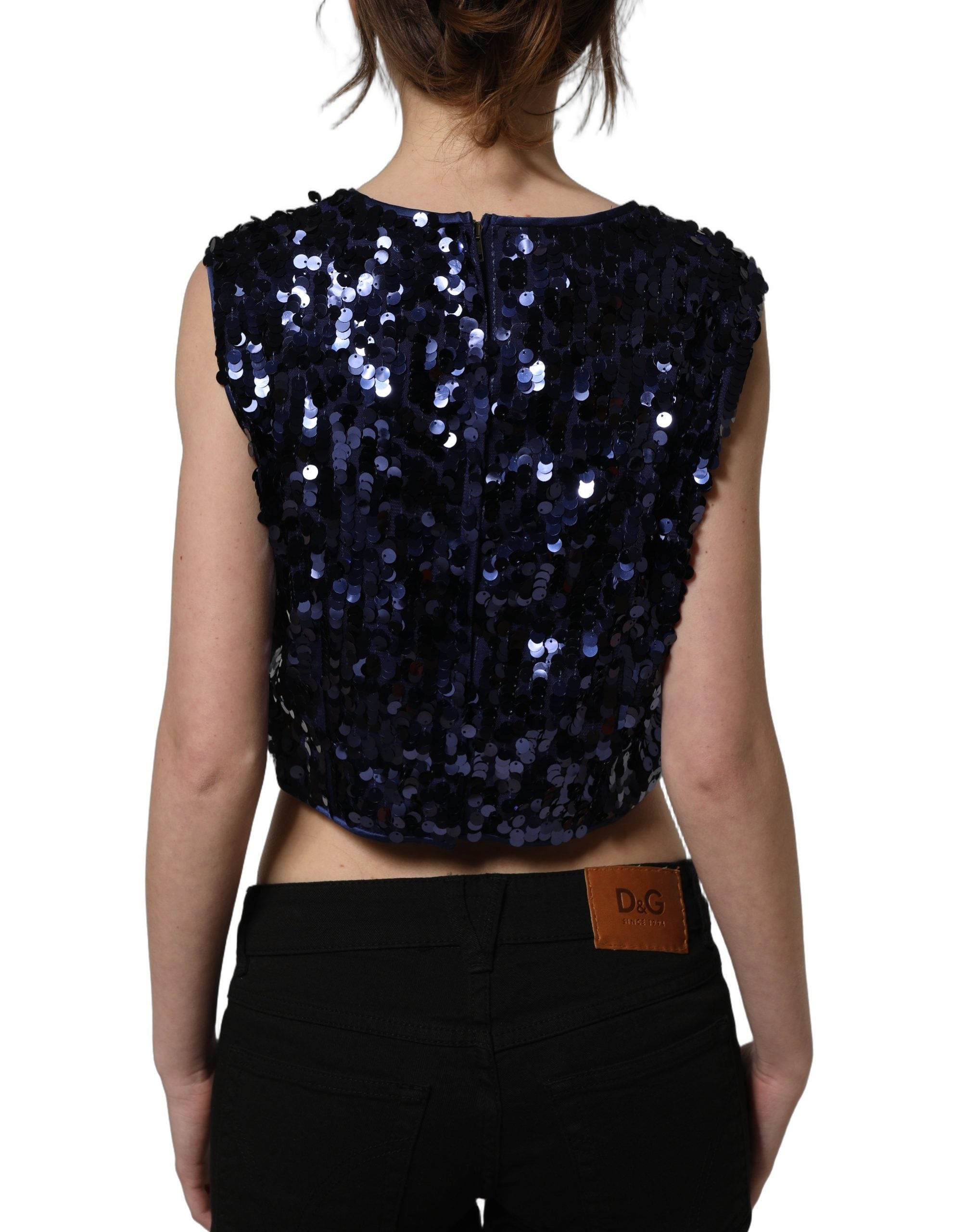Débardeur court sans manches Dolce & Gabbana bleu avec sequins, style crop top, visible détails brillants et tissu élégant.