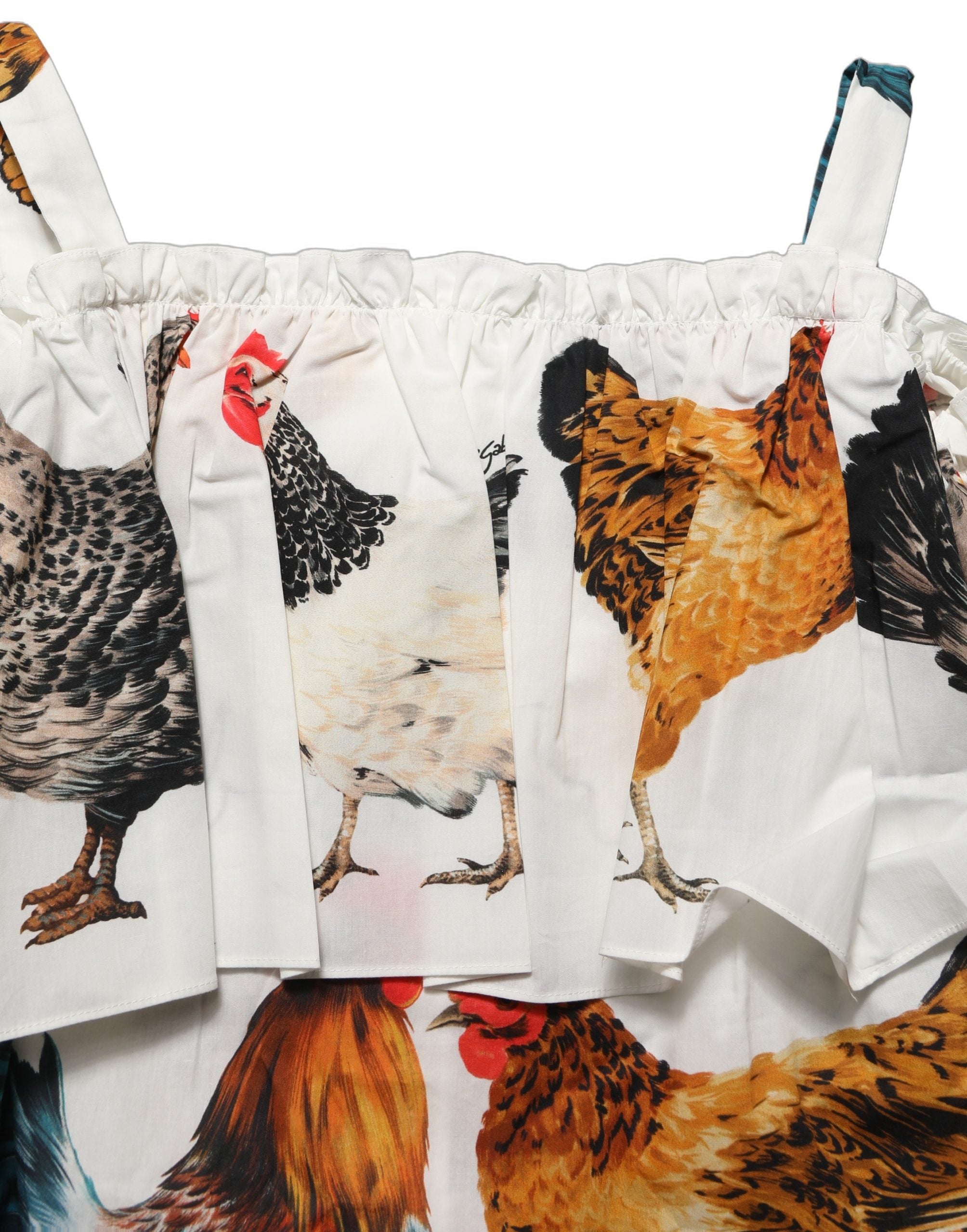 Haut blanc Dolce & Gabbana à imprimé coq en popeline, style épaules dénudées, mode élégante et sophistiquée.