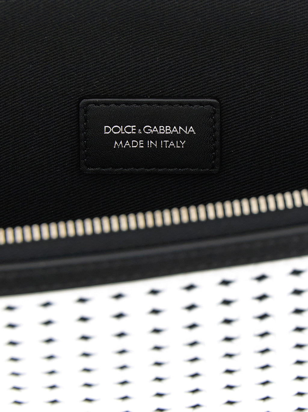 Sac clutch bicolore en cuir de veau Dolce & Gabbana, finition élégante et design sophistiqué pour occasion spéciale.