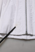 Top corset sans manches en coton blanc et marron de Dolce & Gabbana, détails élégants visibles sur l'image.