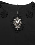 Chemisier en soie noire Dolce & Gabbana avec appliqué en forme de cœur floral, élégant et féminin.