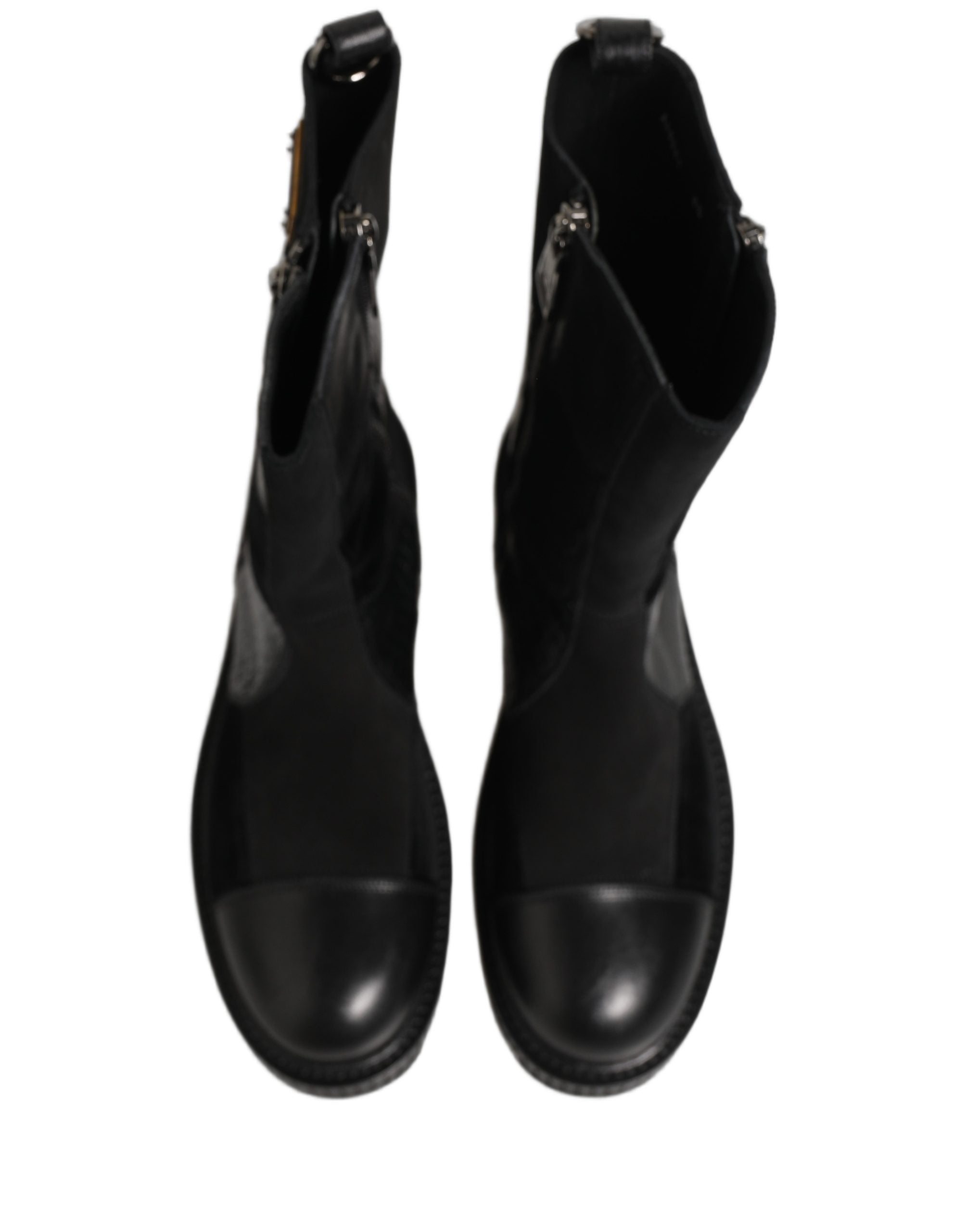 Bottes en cuir patchwork noir Dolce & Gabbana, mi-mollet, avec design élégant et détails de mode sophistiqués.