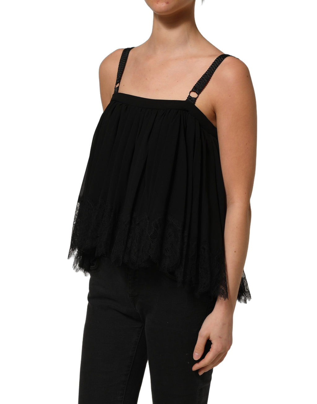 Haut sans manches Dolce & Gabbana en dentelle florale noire, top élégant en tissu léger avec détails délicats.