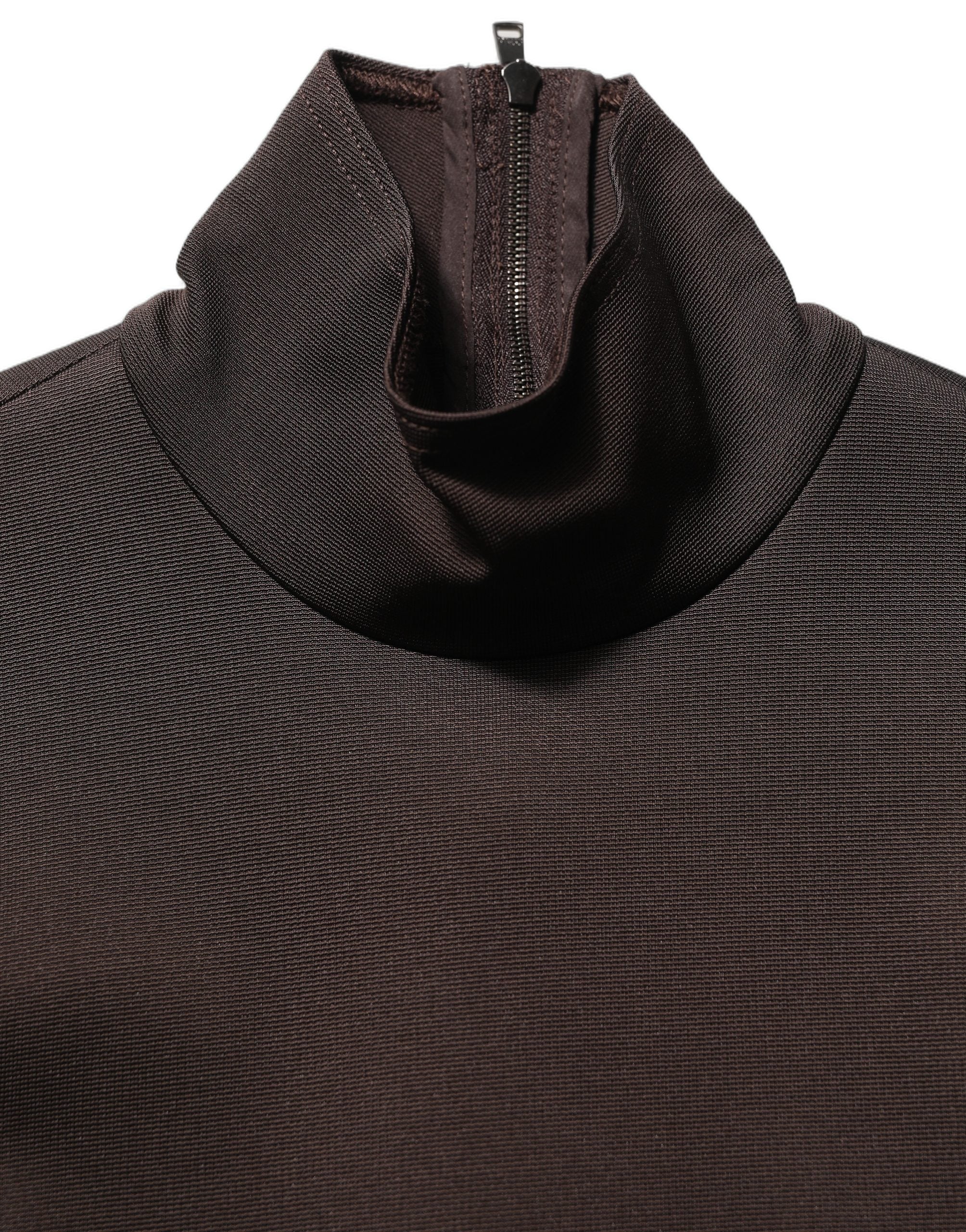 Blouse Dolce & Gabbana marron à col roulé à manches longues, détail élégant et tissu léger visible sur l'image.