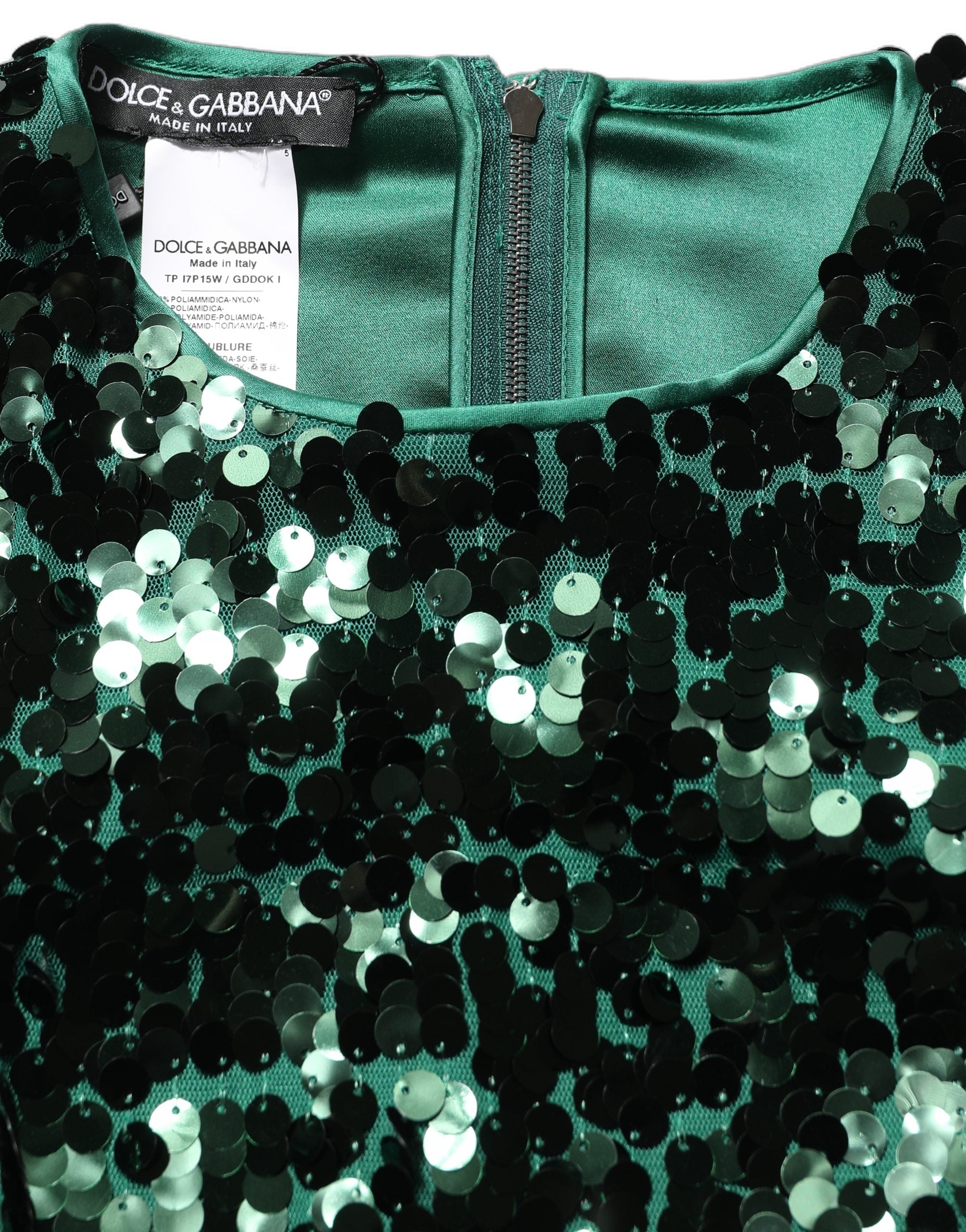 Blouse courte Dolce & Gabbana à manches longues vertes avec sequins, style élégant et brillant.