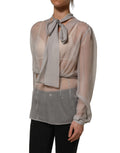 Chemise en soie chiffon gris Dolce & Gabbana avec col en nœud, style élégant et transparent, vue de l'avant.