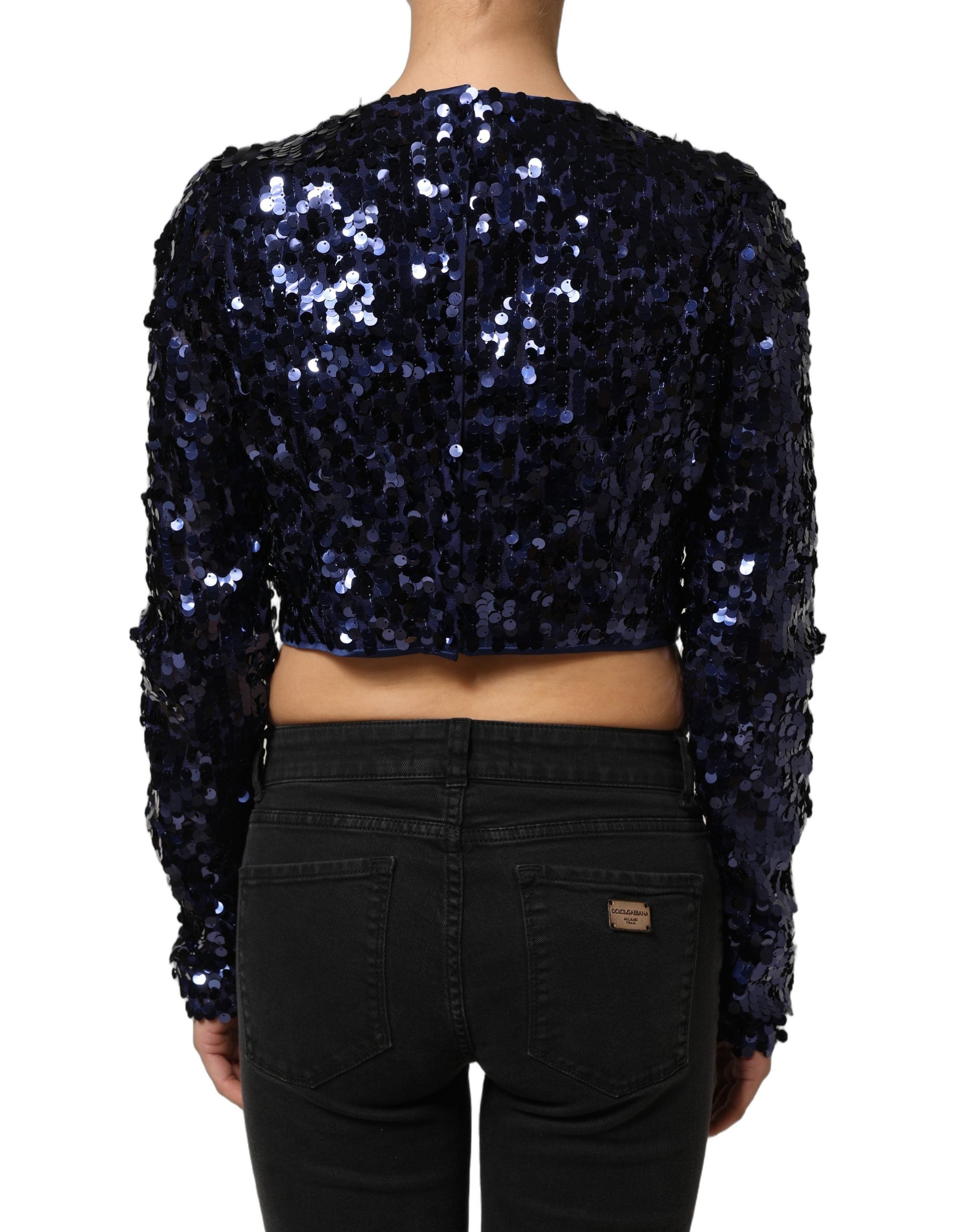 Blouse crop bleue à sequins Dolce & Gabbana à manches longues, style élégant et tendance, vue de face.