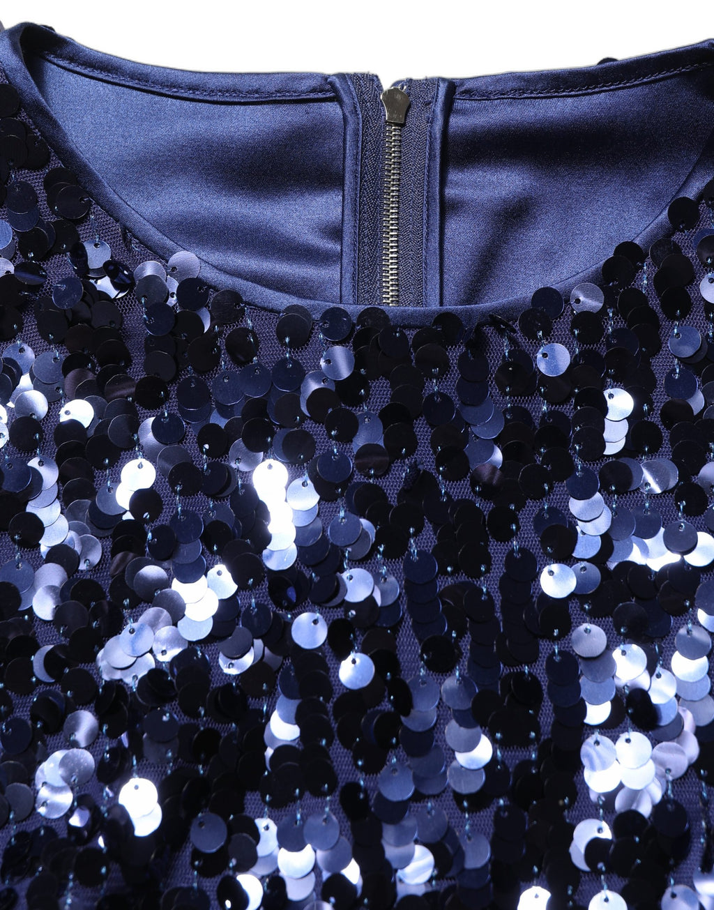 Blouse courte bleue à sequins à manches longues de Dolce & Gabbana, détail élégant et brillant en tissu luxueux.