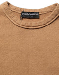 Blouse courte en laine marron Dolce & Gabbana avec manches courtes et coupe cropped, élégante et sophistiquée.