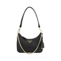 Sac à épaules Prada Bos Taurus en cuir de veau noir, design élégant et sophistiqué, visible en gros plan.