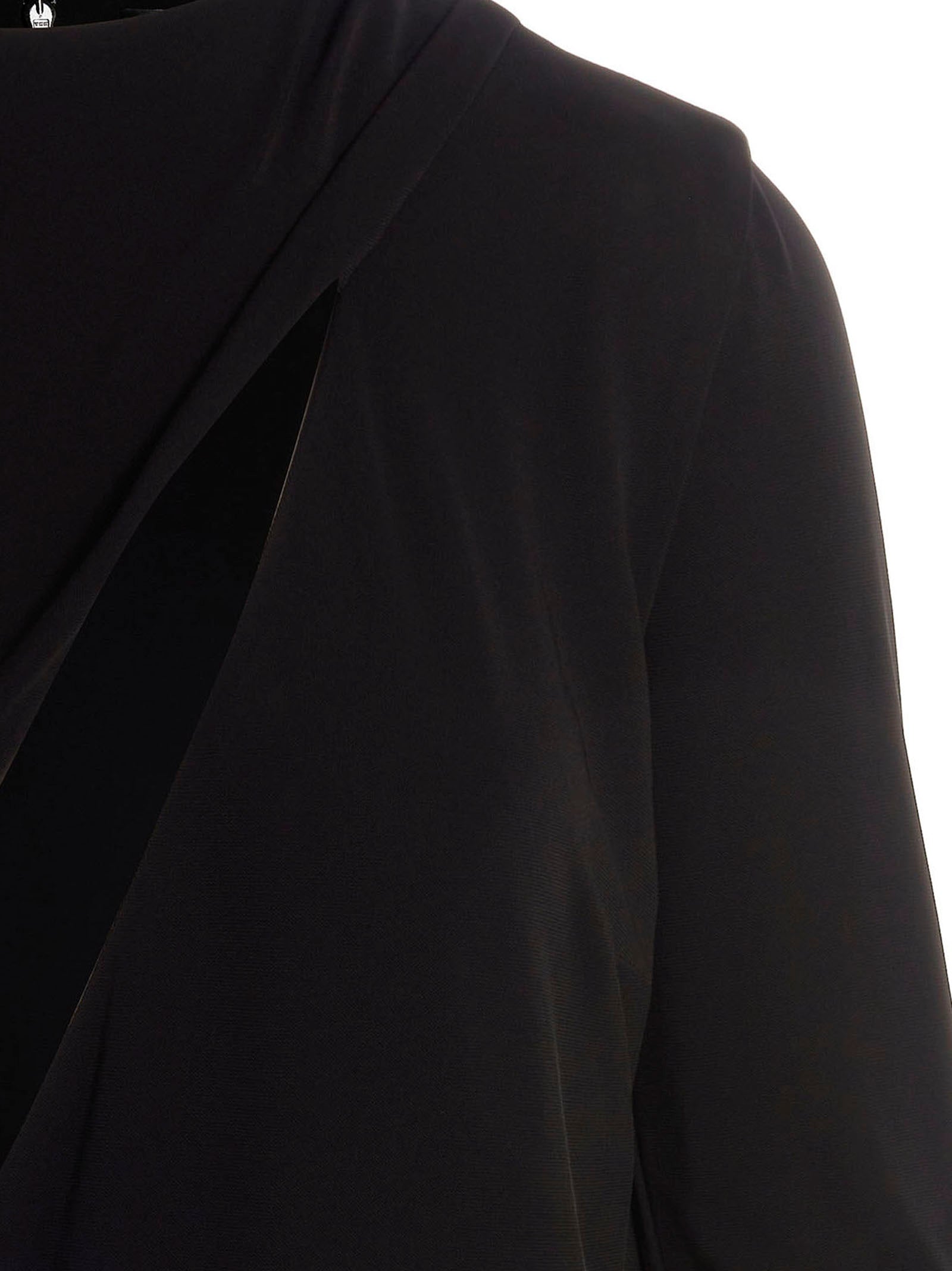 Robe courte noire en viscose de la marque Versace, silhouette élégante et tissu fluide visible sur l'image.
