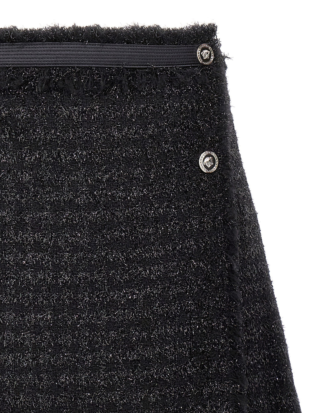 Jupe longue noire en laine vierge Versace, élégante et sophistiquée, avec une coupe fluide et un design classique.