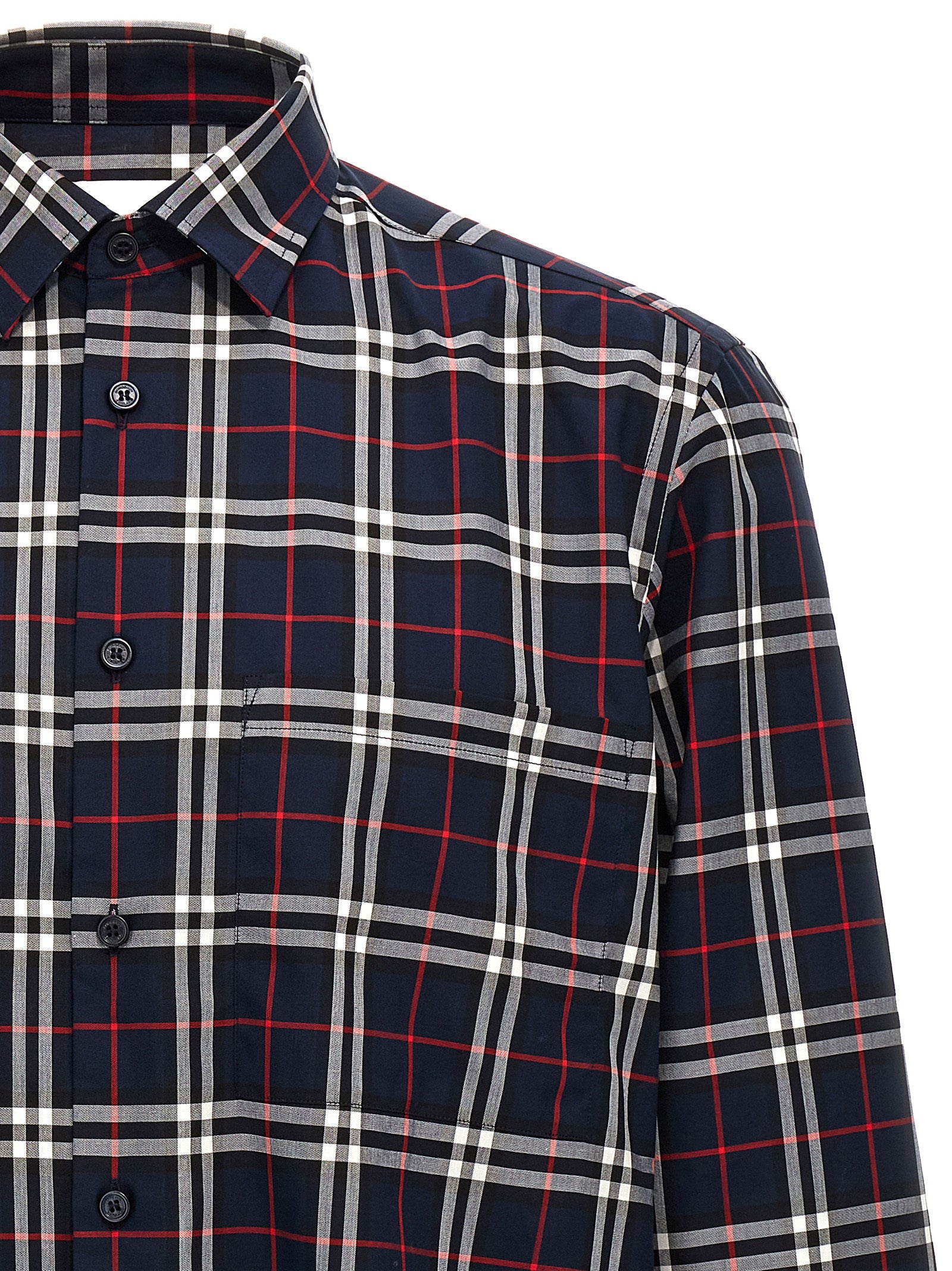 Chemisier en coton bleu Burberry, coupe élégante et détails sophistiqués, idéal pour un style chic et décontracté.