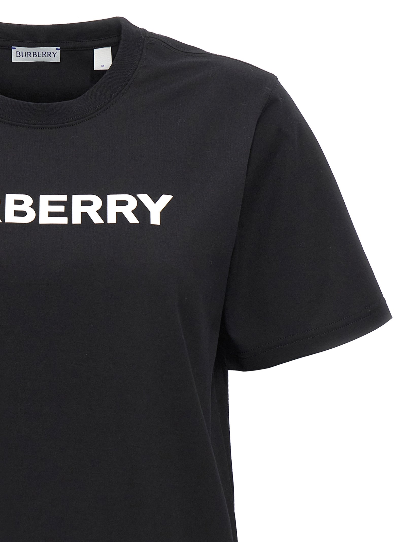 T-shirt en coton bicolore Burberry avec logo, coupe classique, porté sur mannequin, fond neutre.