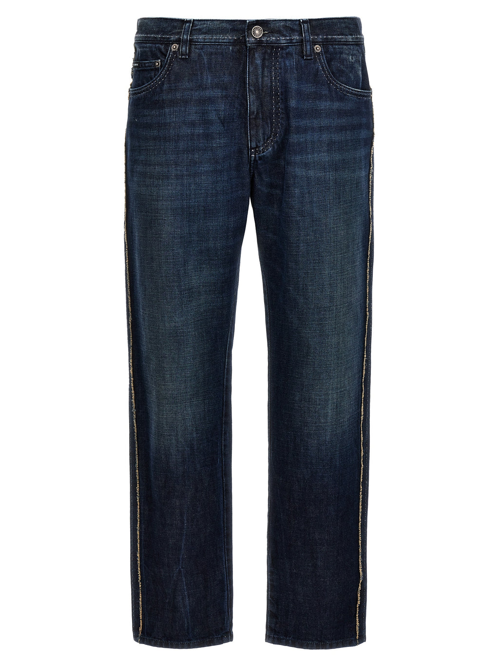 Jeans slim en coton bleu de Dolce & Gabbana, coupe ajustée, porté sur un modèle, détails de couture visibles.