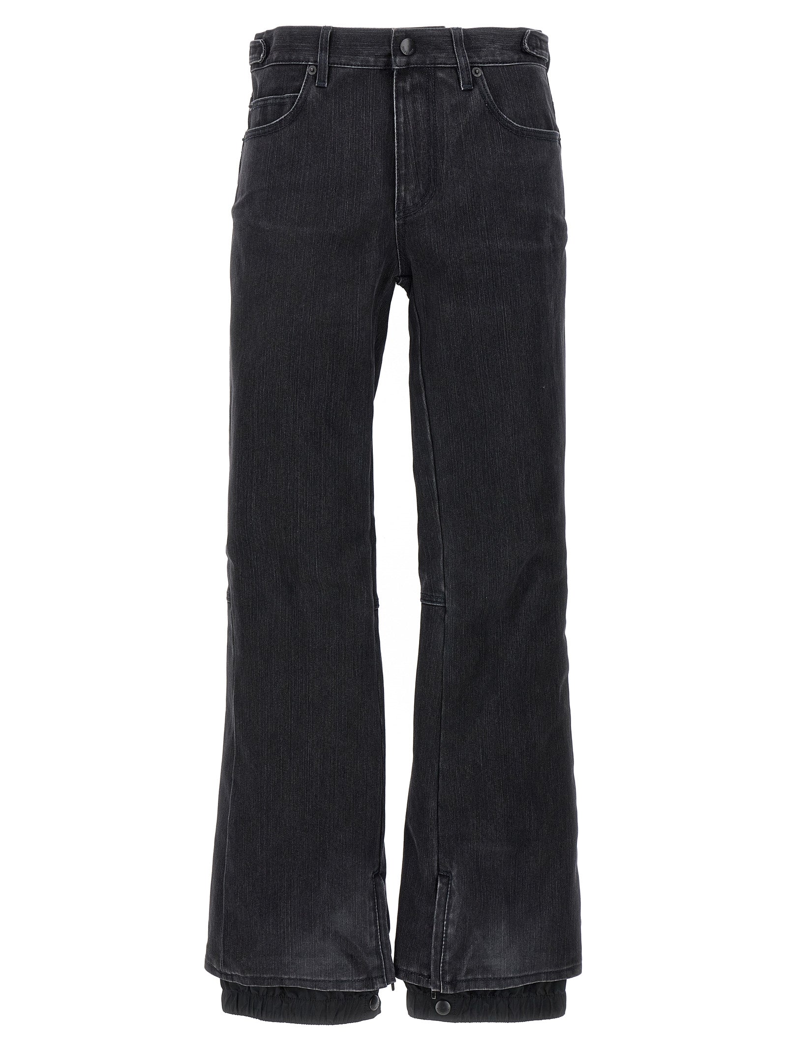 Jeans évasés en coton noir de Balenciaga, style décontracté avec coupe fluide et détails tendance.