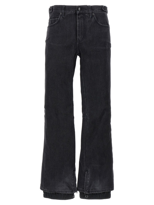 Jeans évasés en coton noir de Balenciaga, style décontracté avec coupe fluide et détails tendance.