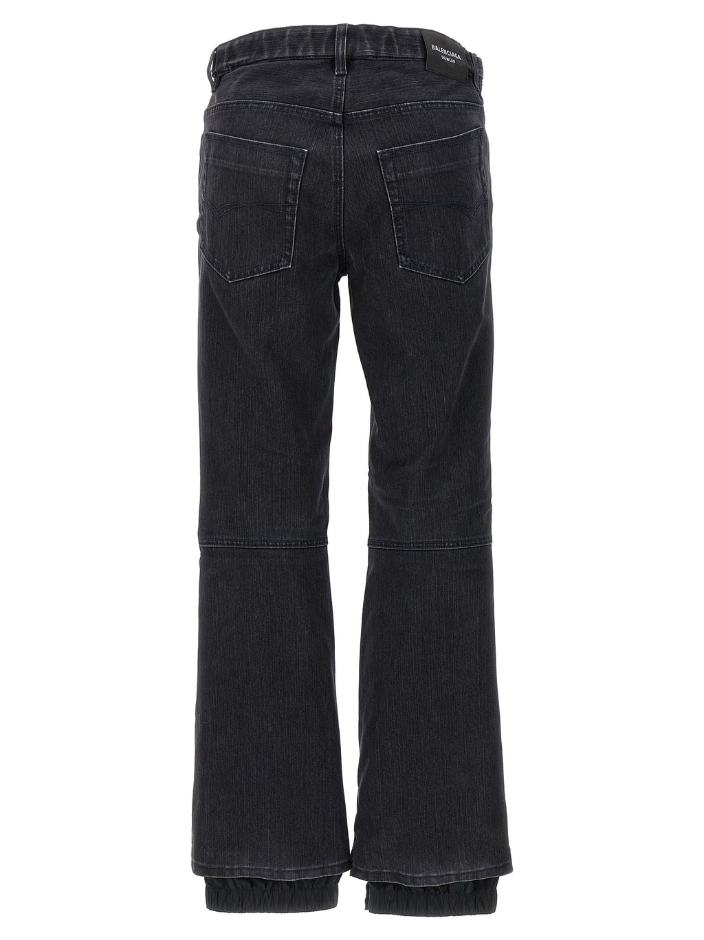 Jeans évasés en coton noir de Balenciaga, denim décontracté avec coupe fluide et détails modernes.