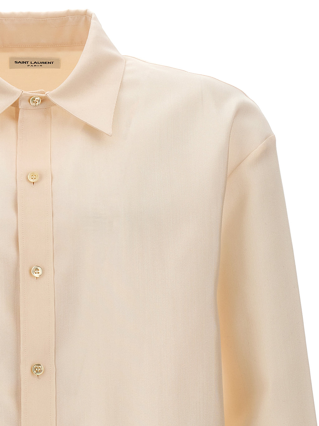 Blouse beige en acétate de la marque Saint Laurent, coupe élégante et design sophistiqué, portée sur mannequins.