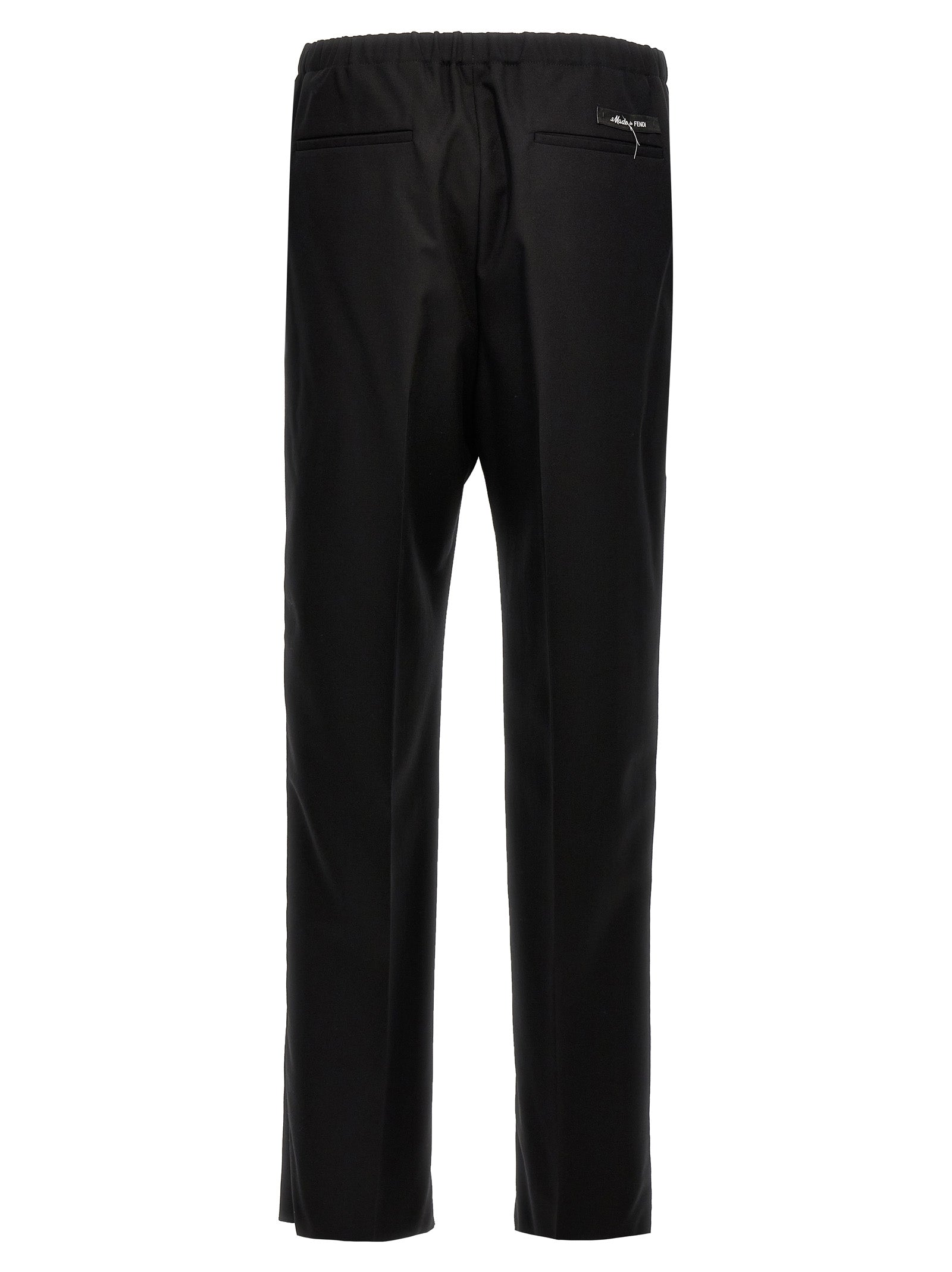 Pantalon de costume noir en laine vierge de Fendi, coupe élégante et tissu de qualité, sur un mannequin.