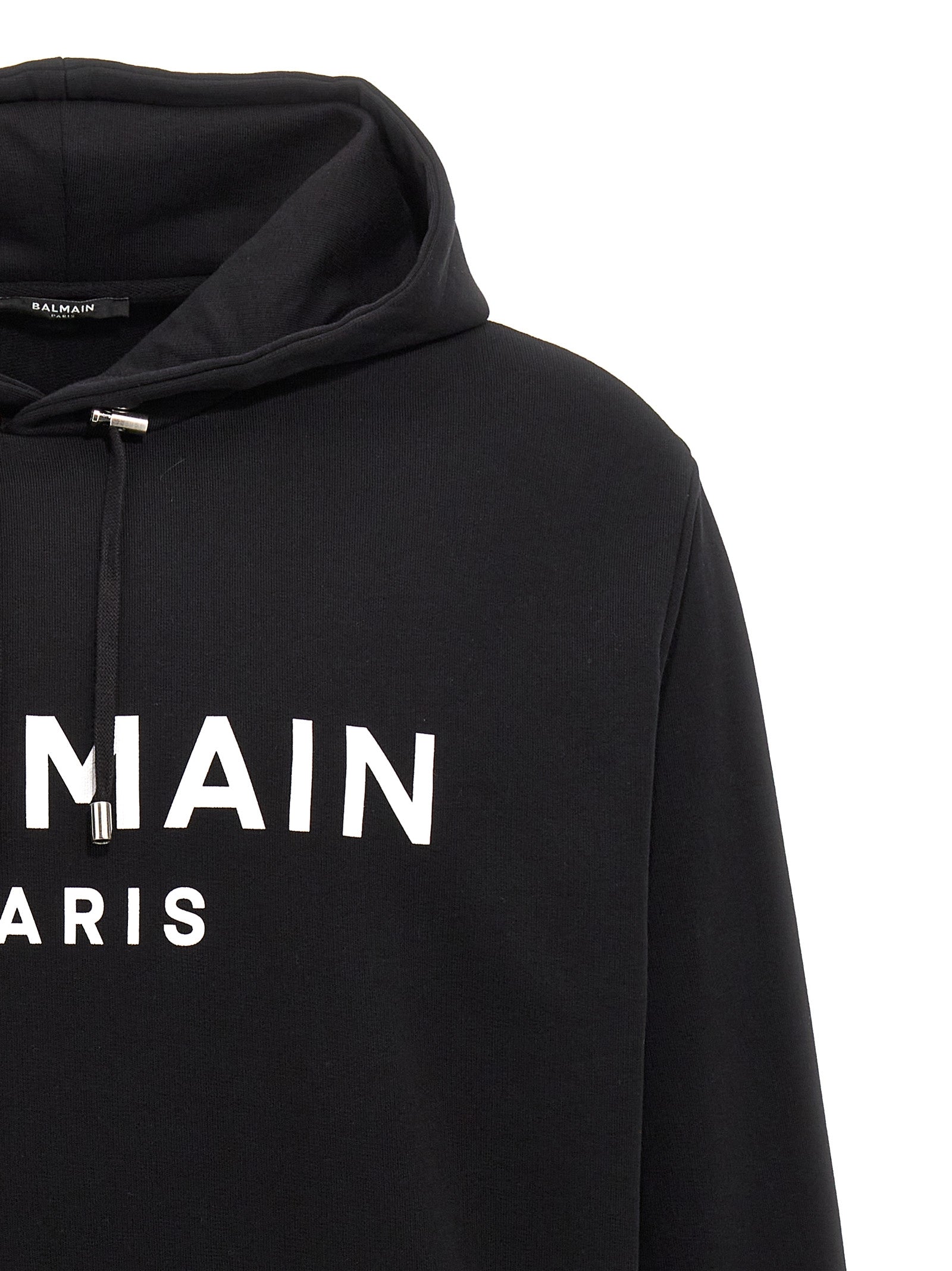 Sweat-shirt bicolore en coton de Balmain, avec logo brodé, porté par un mannequin, vue de face.