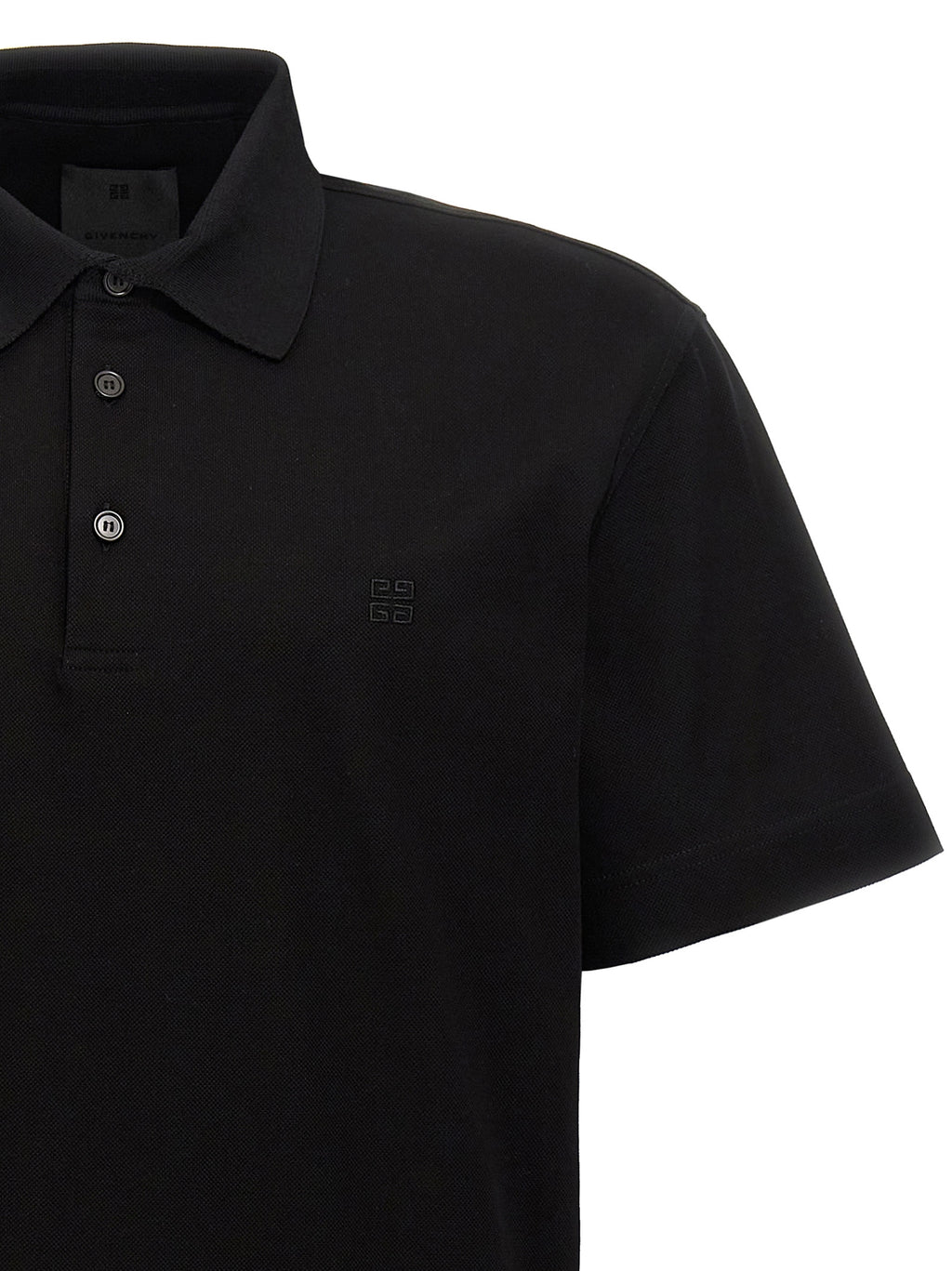 Polo en coton noir Givenchy, chemise élégante à col classique et manches courtes, vue de face.
